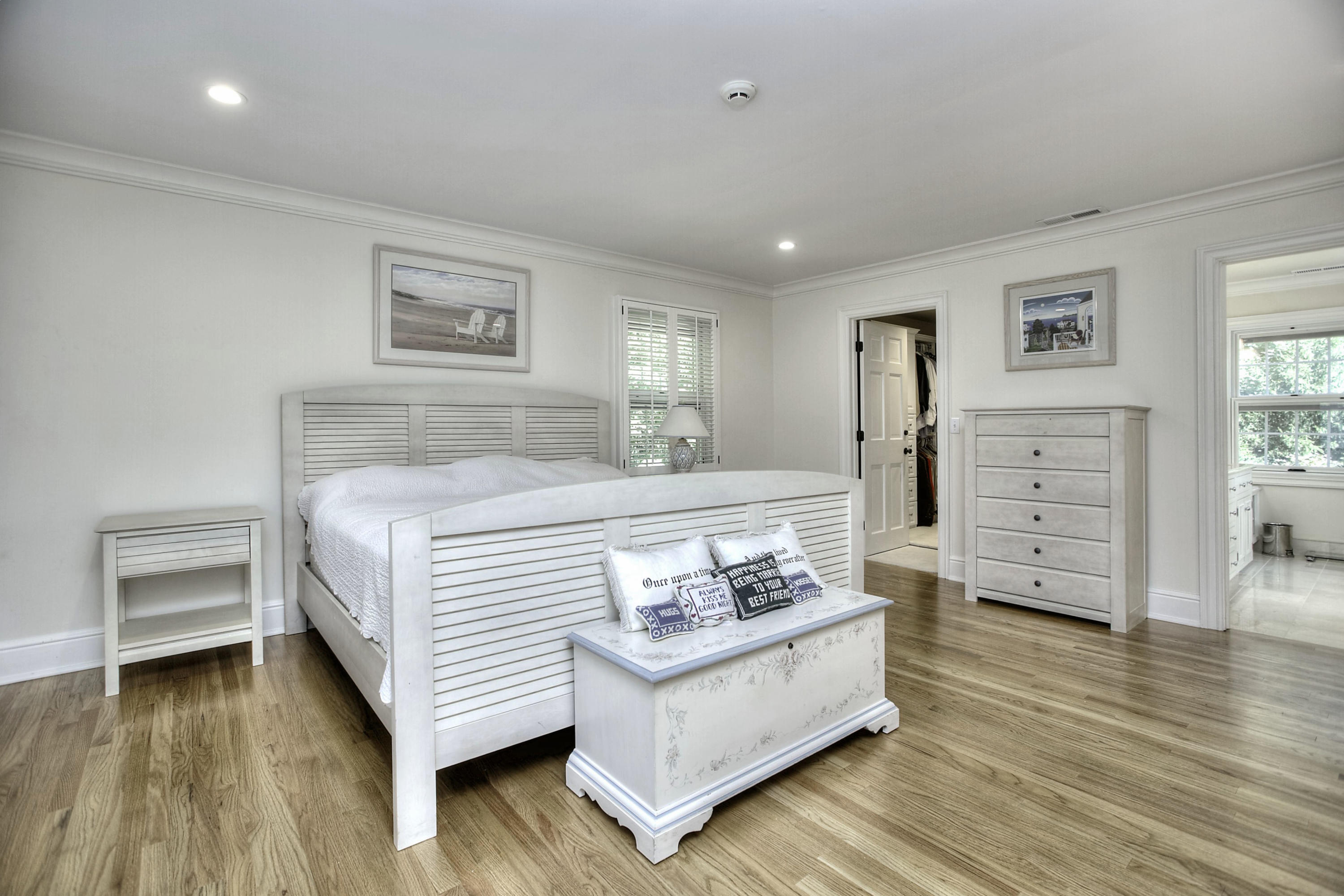 176 Marshall Ridge Road New Canaan, CT 06840 - Photo 11 of 29 a bedroom with furniture and a wooden floor