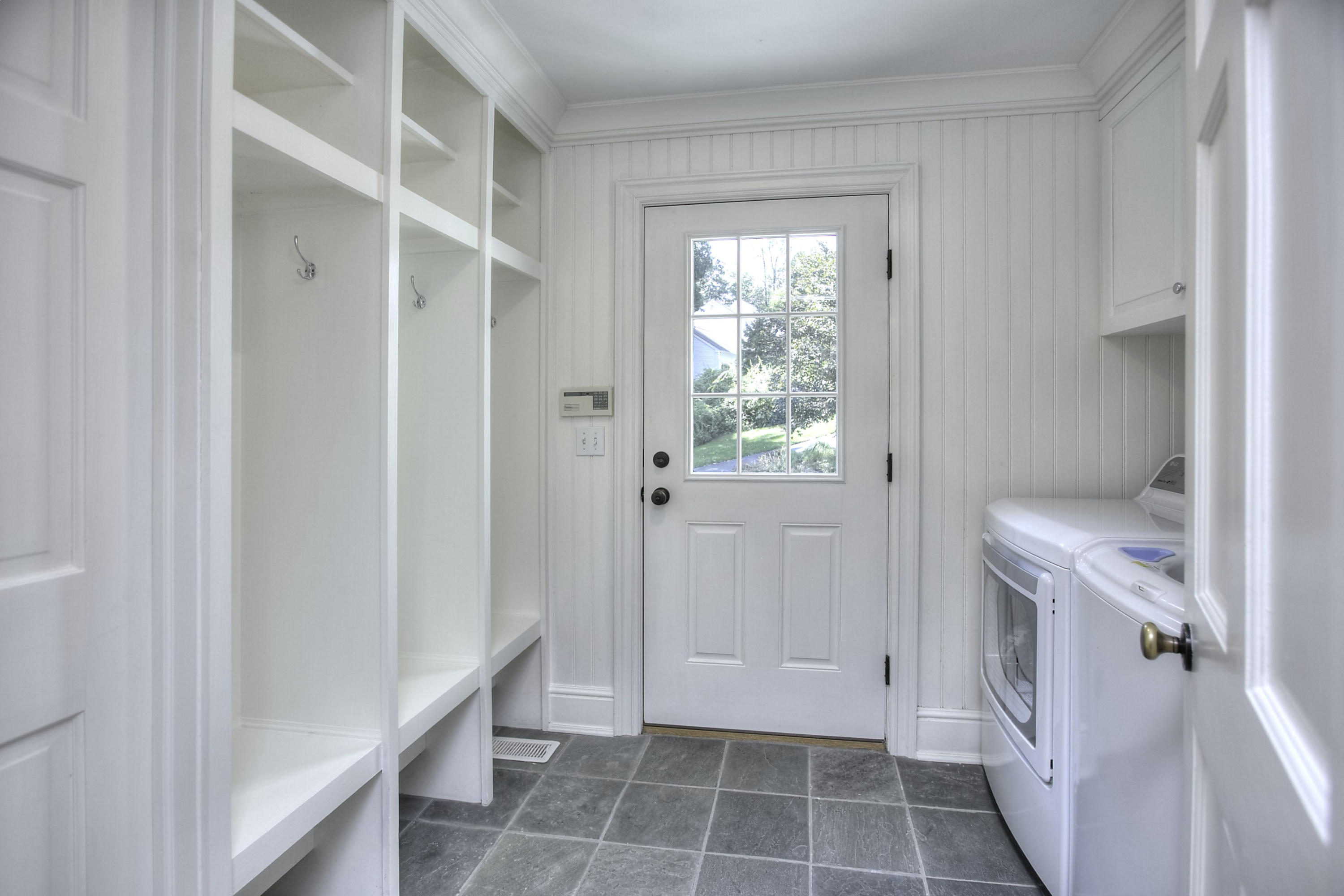 176 Marshall Ridge Road New Canaan, CT 06840 - Photo 15 of 29 a bathroom with a tub shower and a sink