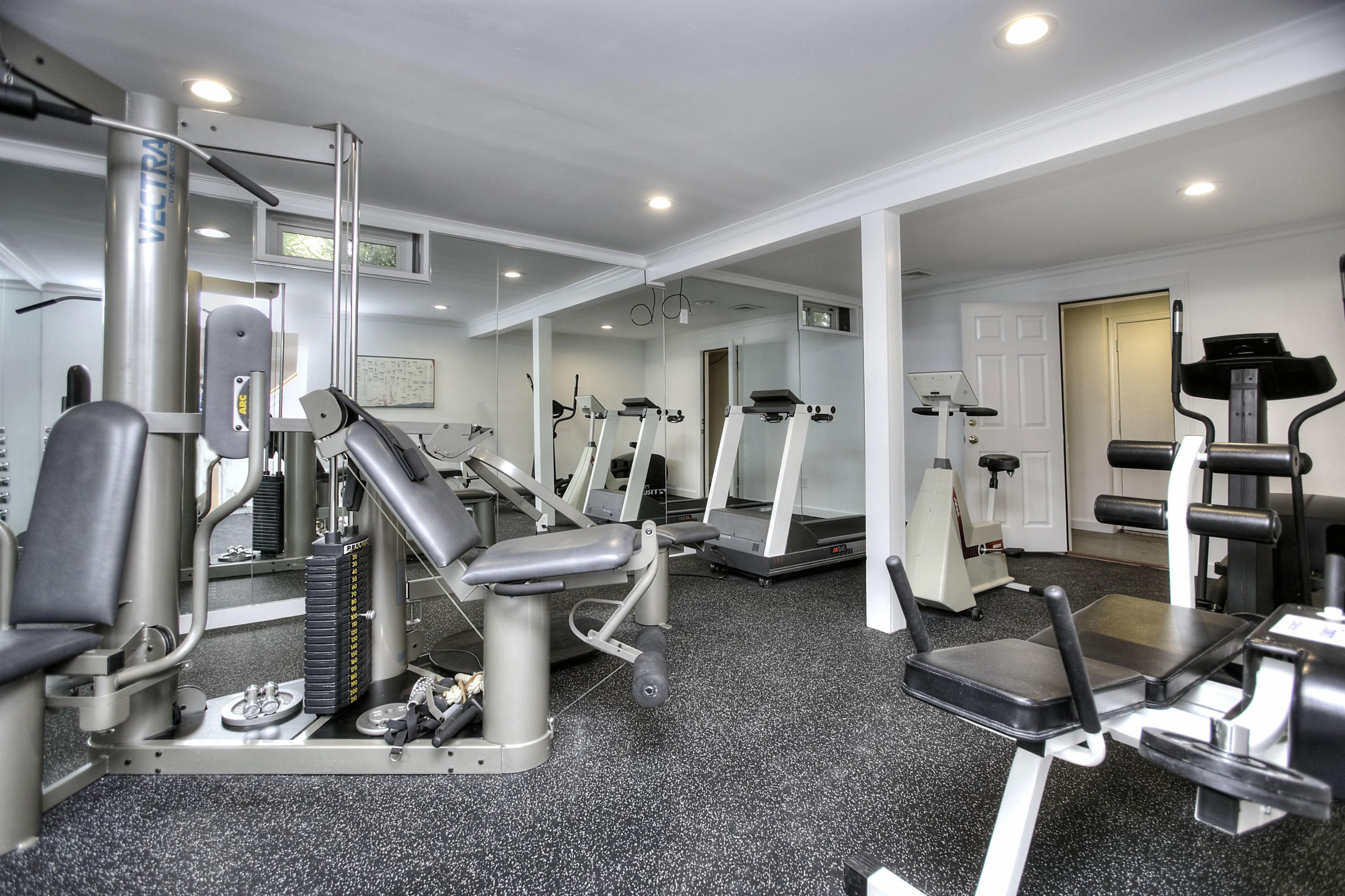 176 Marshall Ridge Road New Canaan, CT 06840 - Photo 16 of 29 a view of a room with gym equipment