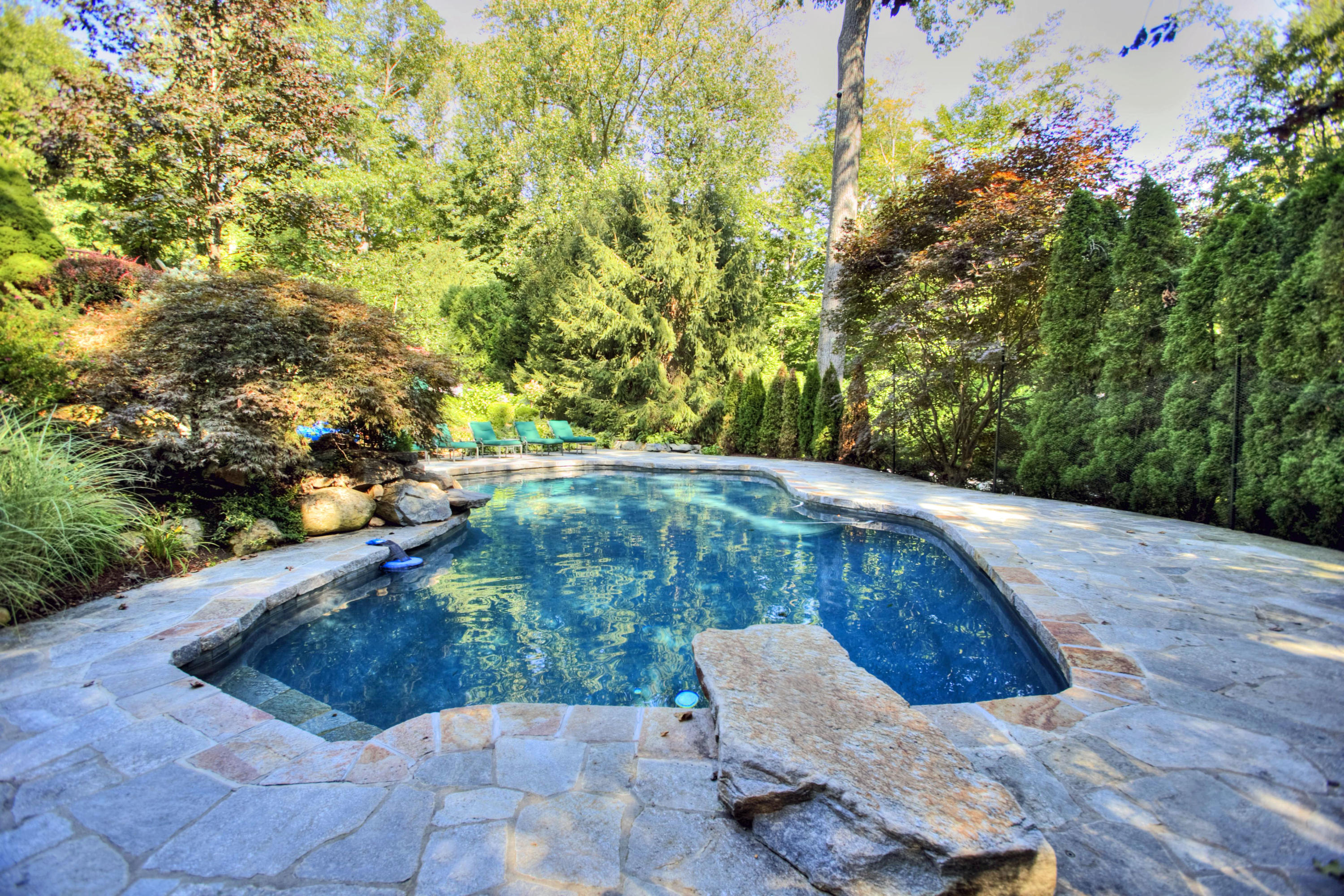 176 Marshall Ridge Road New Canaan, CT 06840 - Photo 20 of 29 a view of a back yard of the house