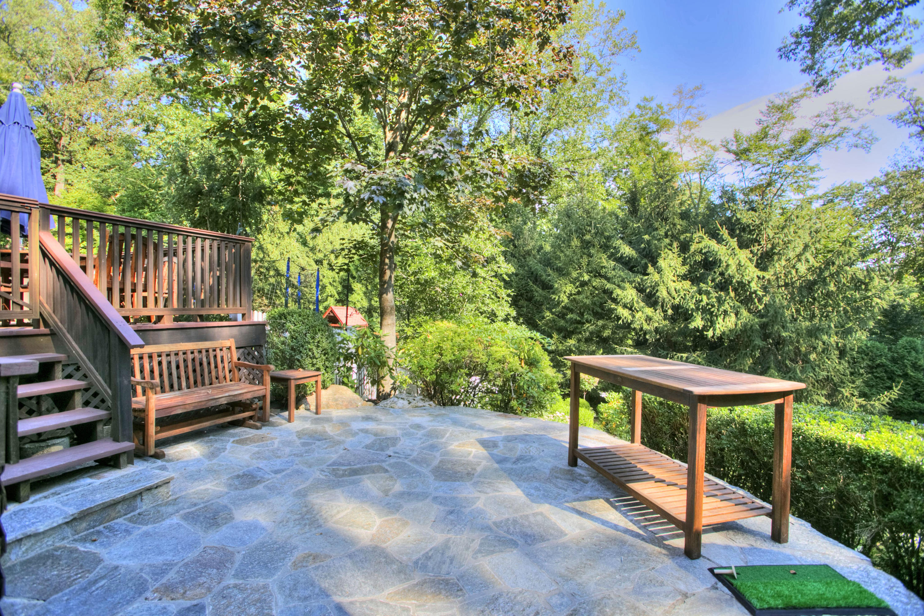 176 Marshall Ridge Road New Canaan, CT 06840 - Photo 27 of 29 a view of a deck with chairs and wooden fence