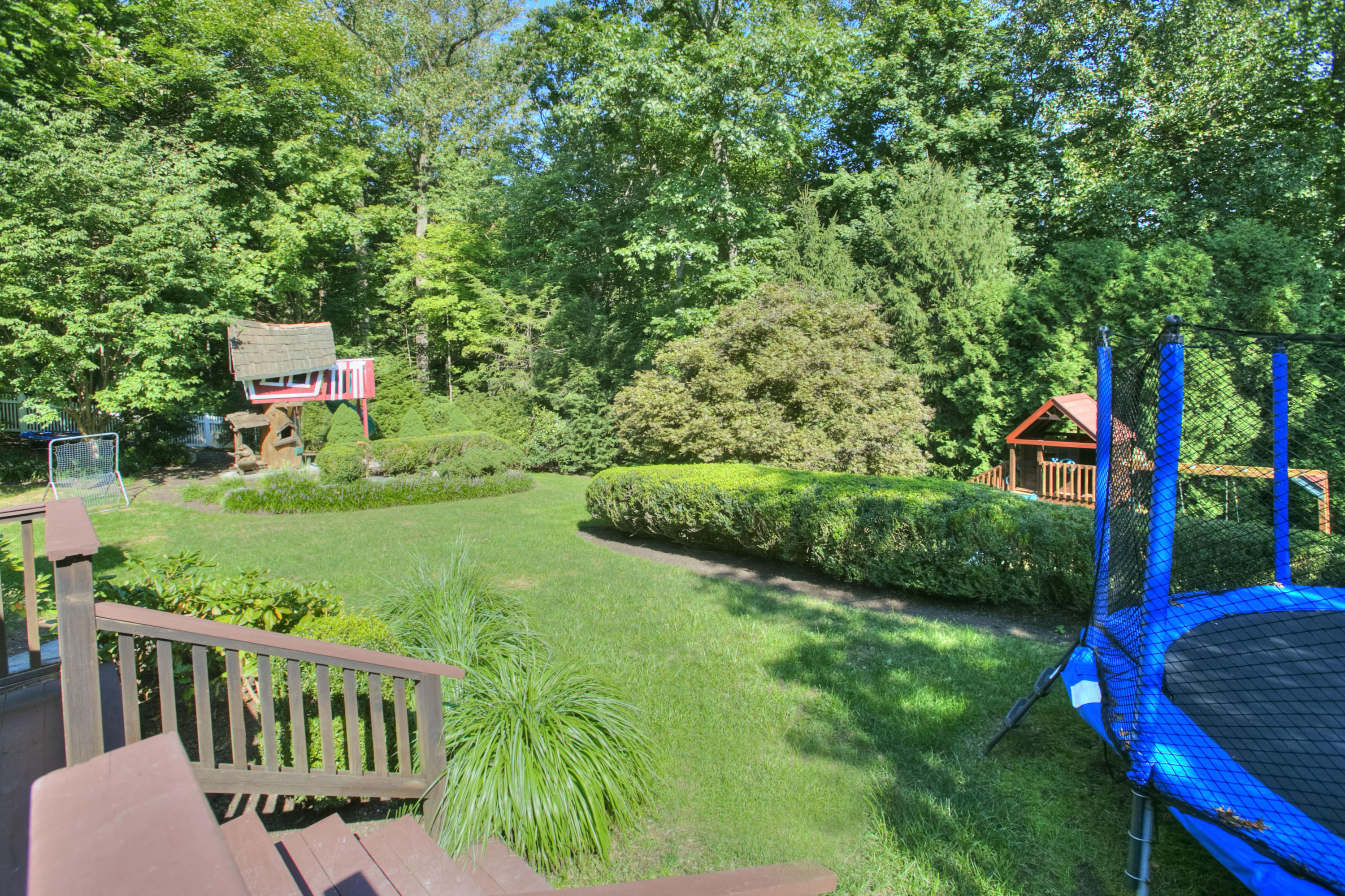 176 Marshall Ridge Road New Canaan, CT 06840 - Photo 29 of 29 a view of an house with backyard and sitting area