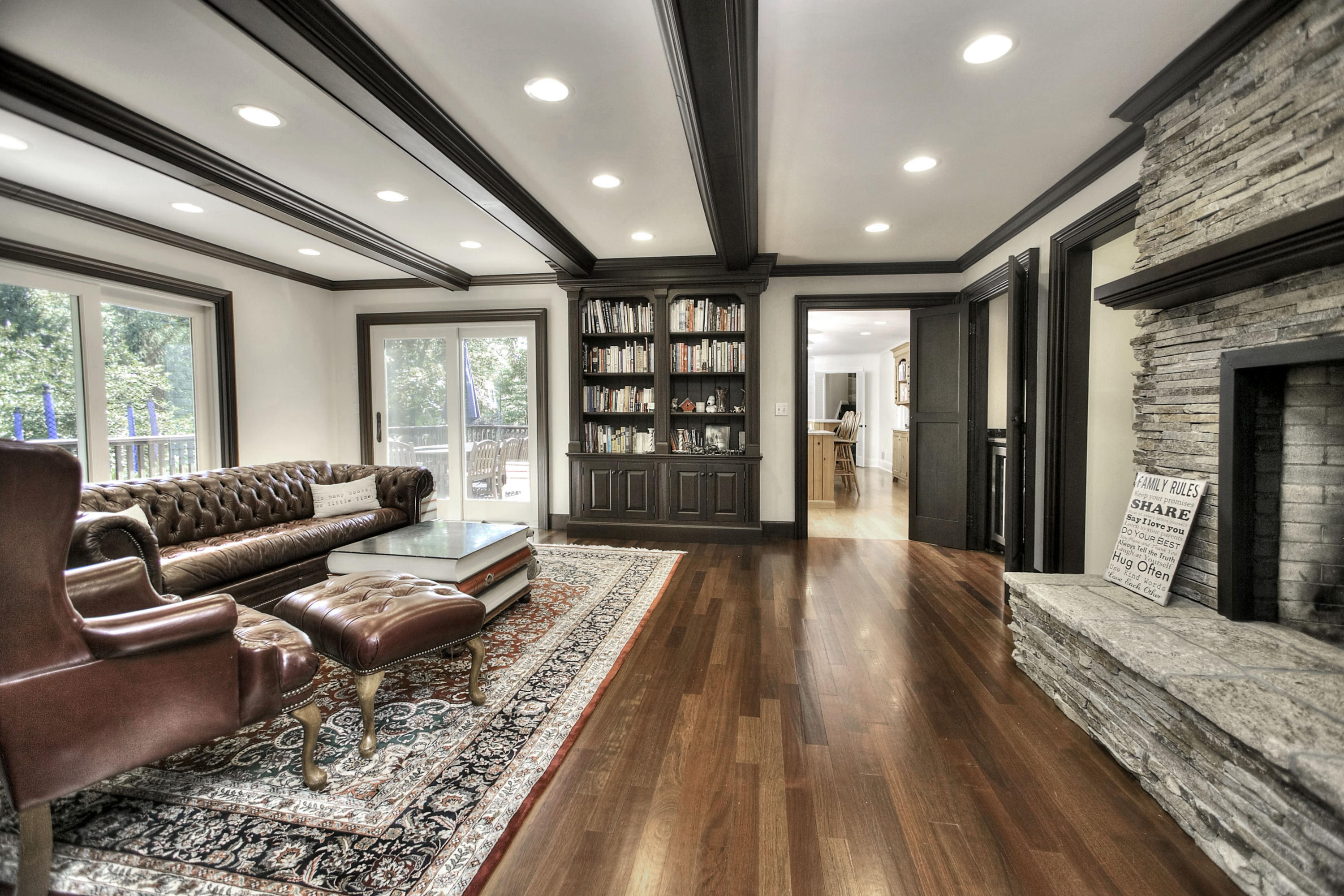 176 Marshall Ridge Road New Canaan, CT 06840 - Photo 5 of 29 a living room with furniture fireplace and wooden floor