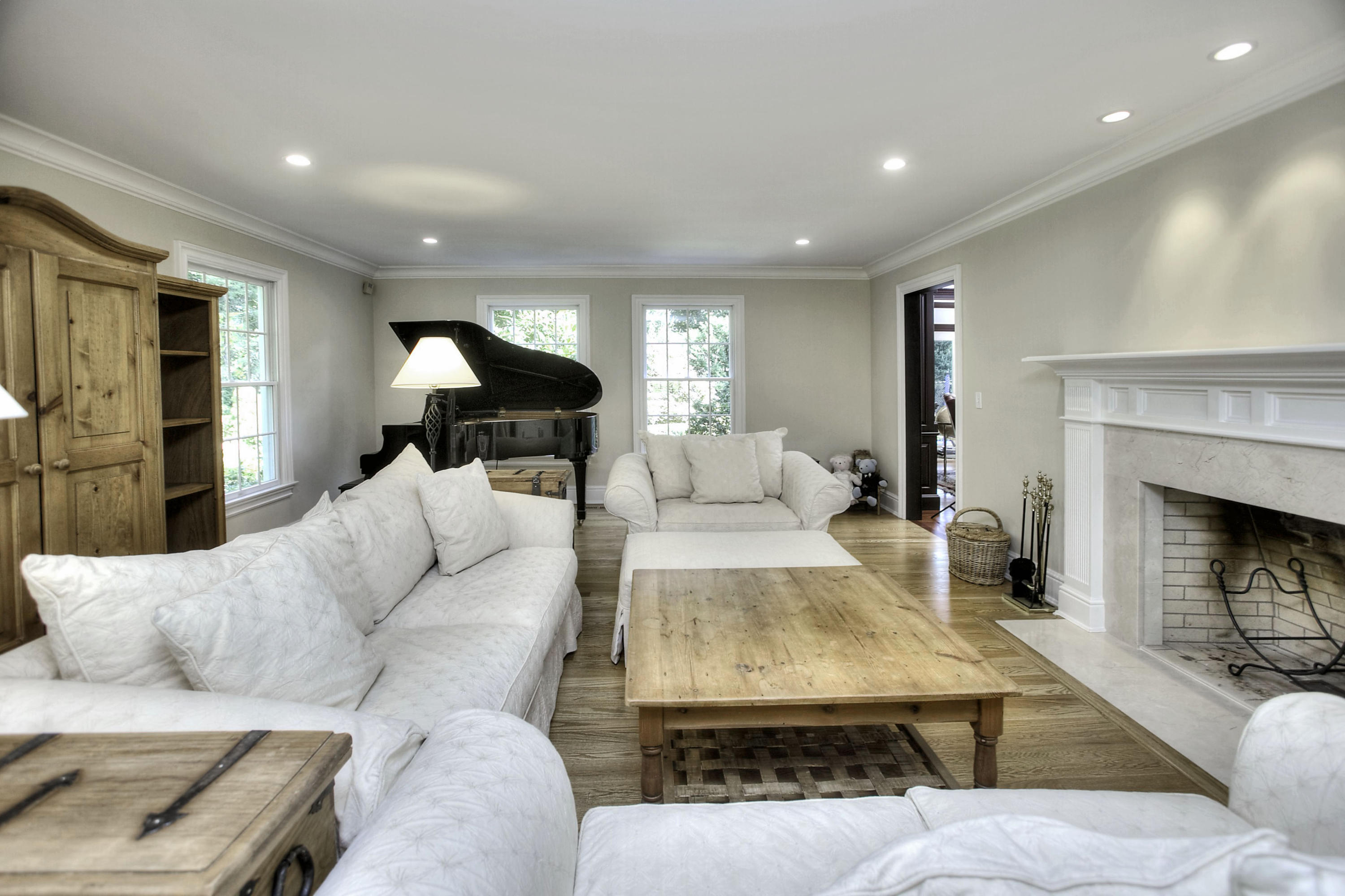 176 Marshall Ridge Road New Canaan, CT 06840 - Photo 7 of 29 a living room with furniture and a fireplace