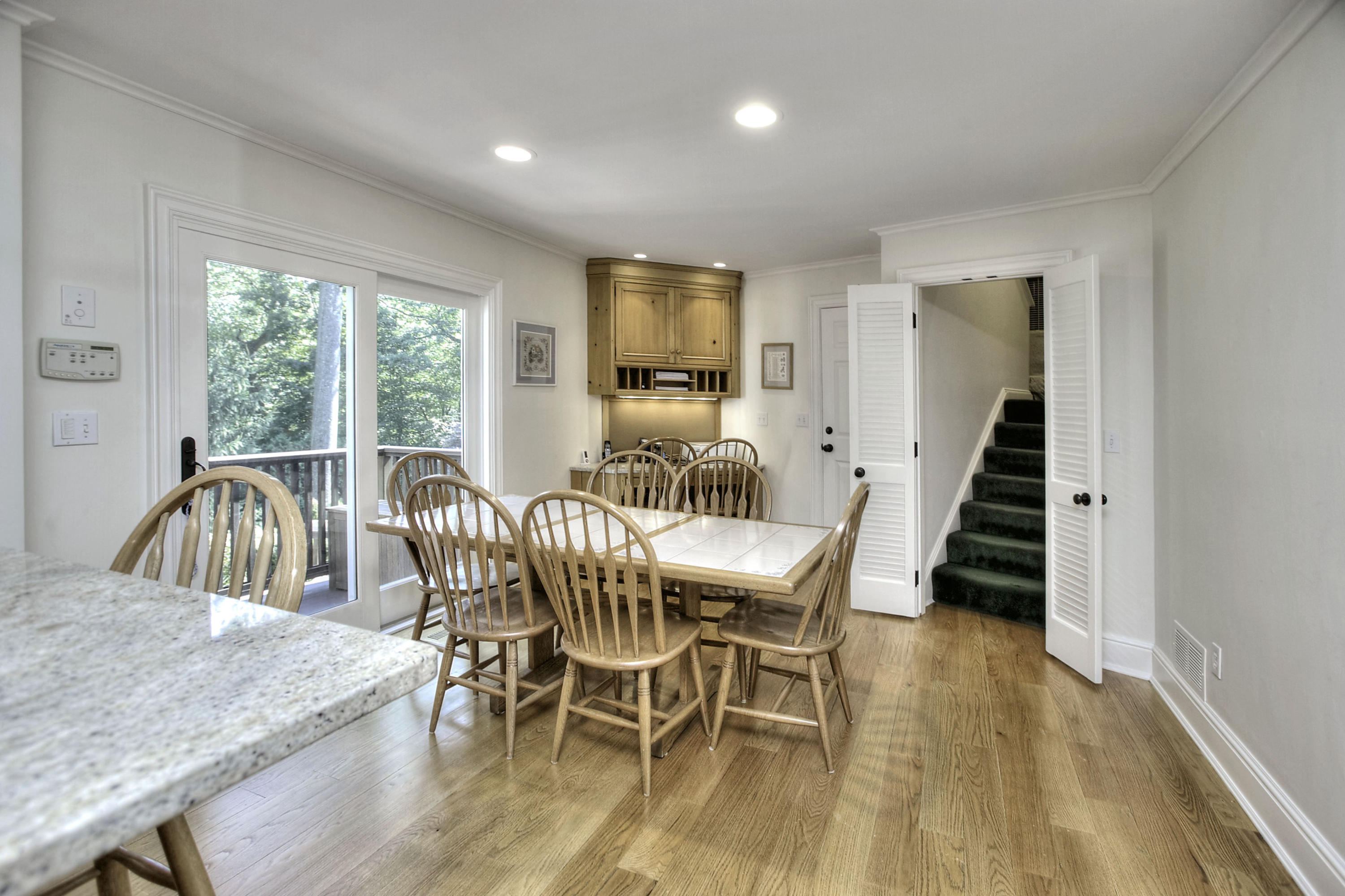 176 Marshall Ridge Road New Canaan, CT 06840 - Photo 9 of 29 a view of a dining room with furniture window and wooden floor