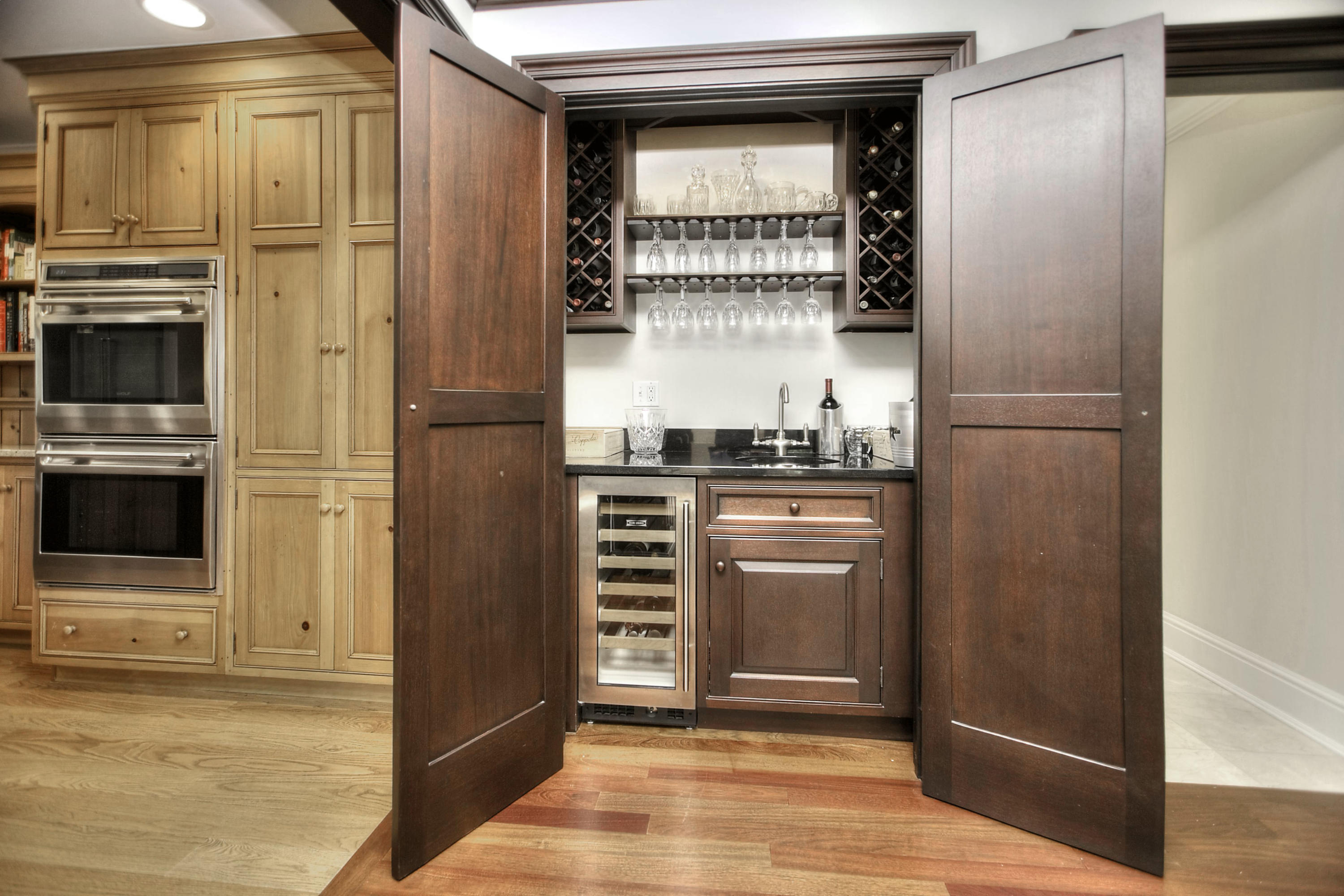 176 Marshall Ridge Road New Canaan, CT 06840 - Photo 10 of 29 a kitchen with stainless steel appliances granite countertop a refrigerator and a stove top oven