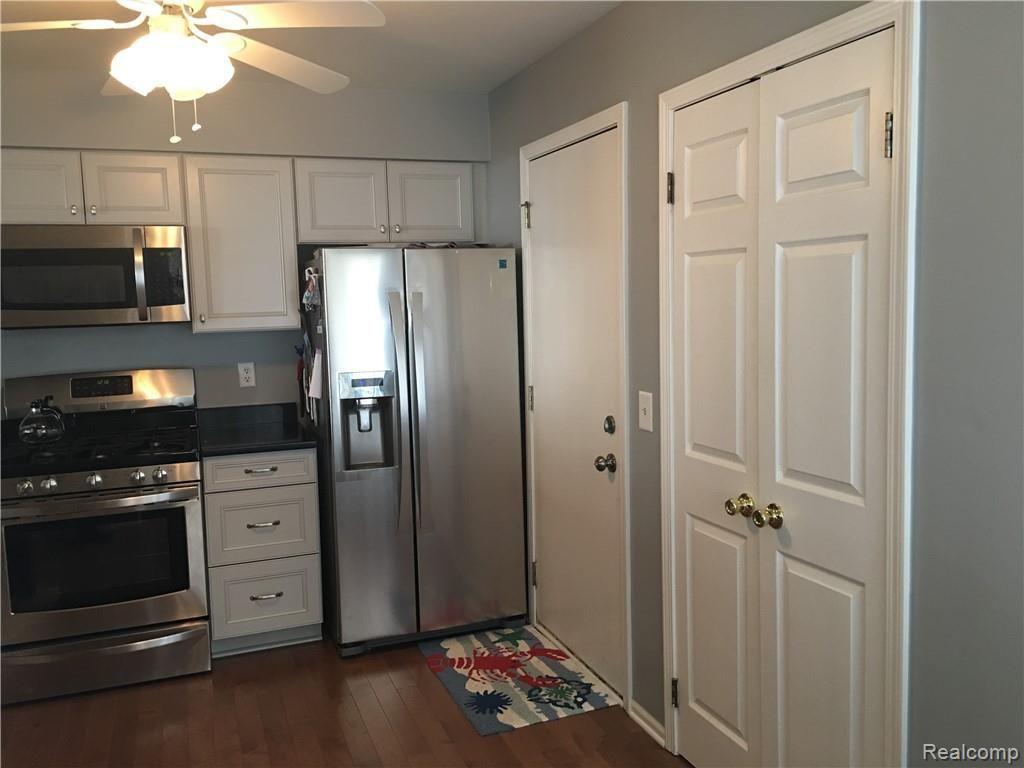 629 Summit Ridge Drive, Unit 13 Milford, MI 48381 - Photo 20 of 59 DIRECT ACCESS TO GARAGE AND A PANTRY
