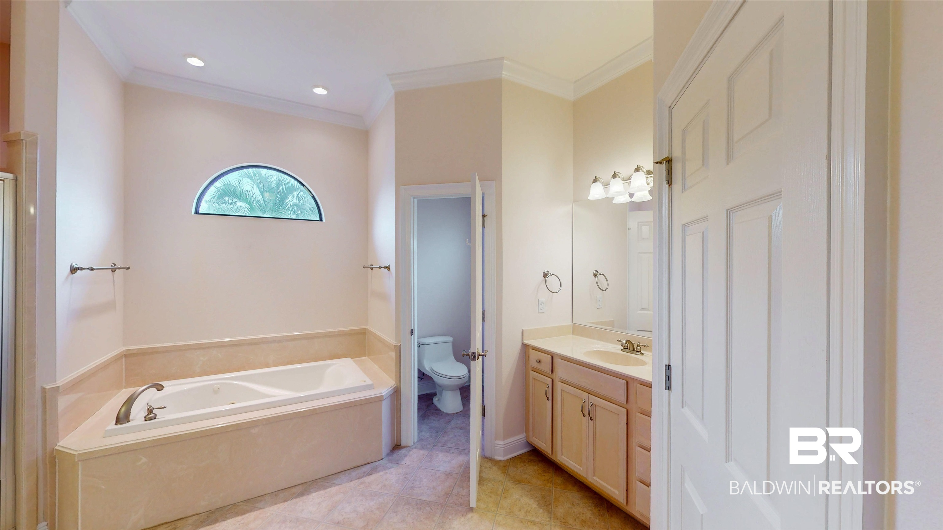 214 Hemingway Loop Foley, AL 36535 - Photo 27 of 67 Full bathroom featuring crown molding, vanity, light tile patterned floors, a bath, and recessed lighting
