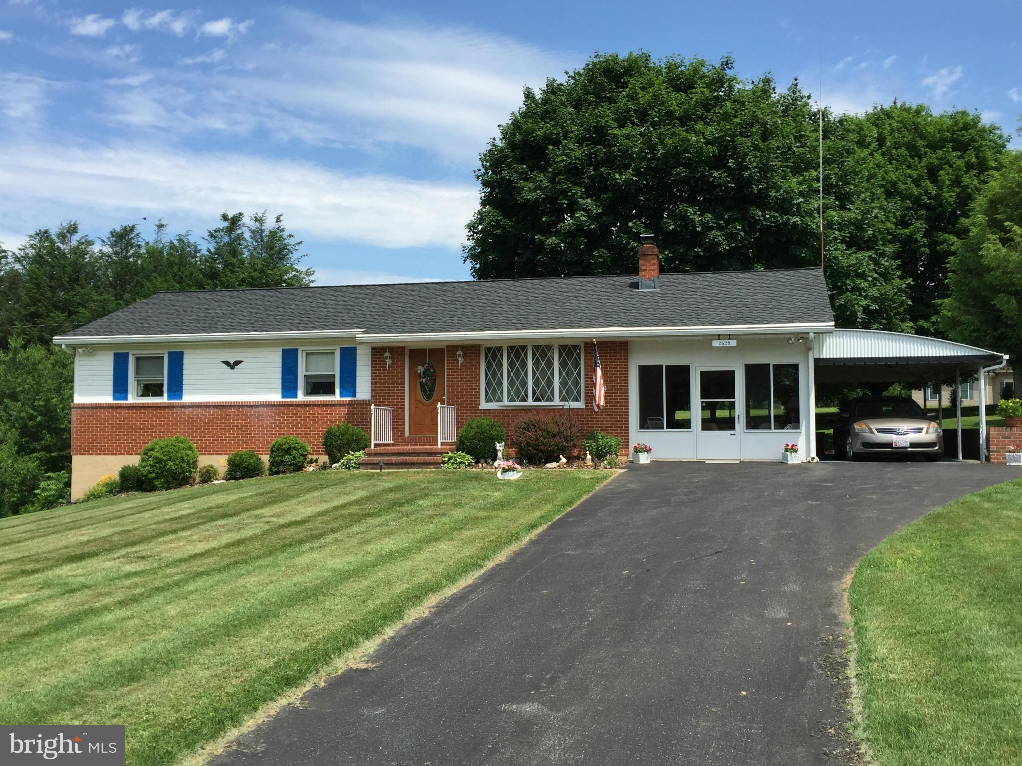 2528 Greene Road Baldwin, MD 21013 - Photo 2 of 30 front view of a house with a garden