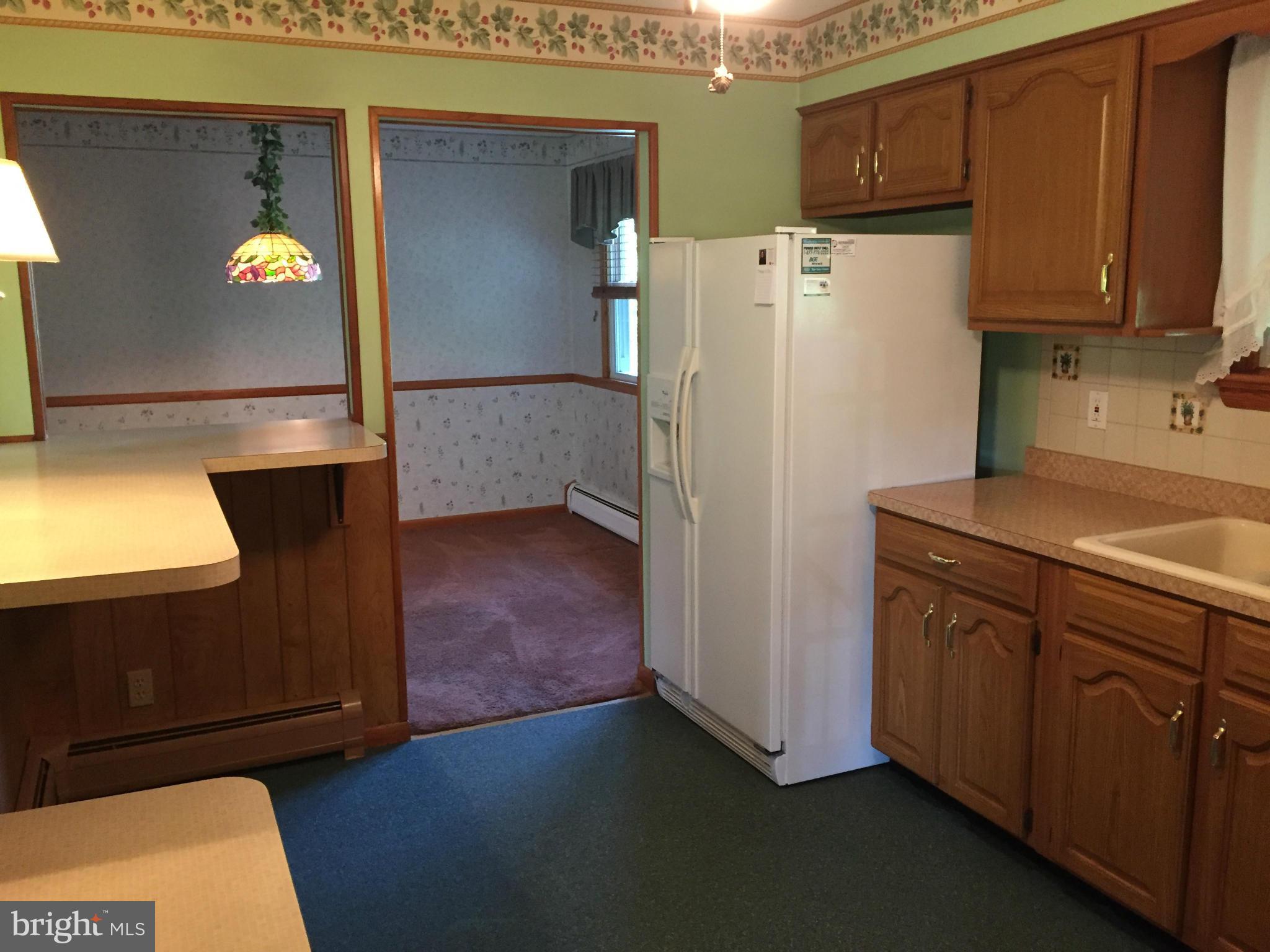 2528 Greene Road Baldwin, MD 21013 - Photo 14 of 30 a utility room with wooden floor washer and dryer