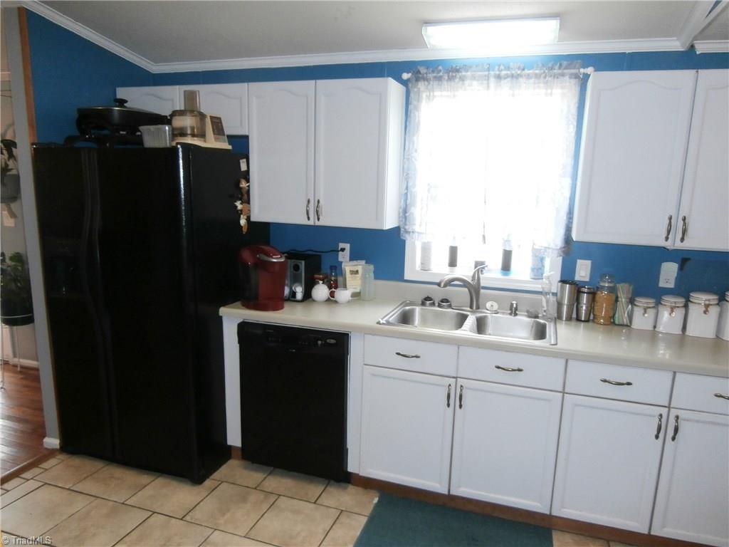 2542 Young Road Walnut Cove, NC 27052 - Photo 12 of 28 Fridge Remains with the house