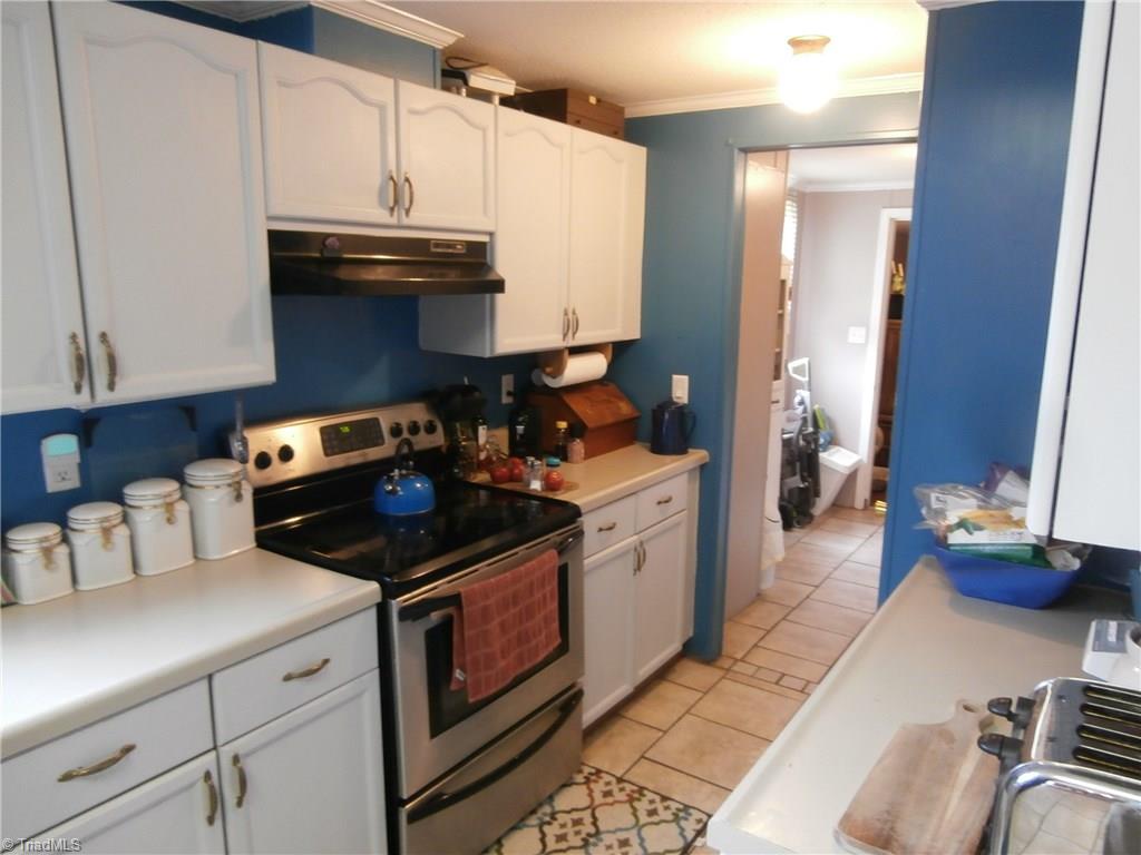 2542 Young Road Walnut Cove, NC 27052 - Photo 13 of 28 Smooth top range remains also