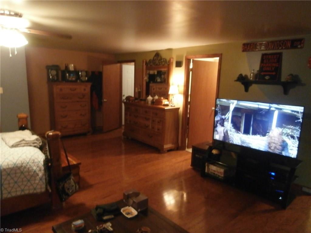 2542 Young Road Walnut Cove, NC 27052 - Photo 14 of 28 ENORMOUS Master Bedroom W/Hardwoods