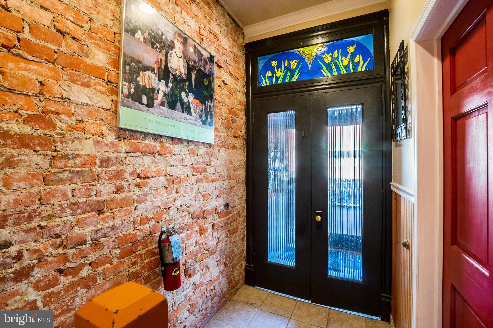 1720 Moore Street, Unit 2 Philadelphia, PA 19145 - Photo 14 of 15 a sign that is on the wall of building