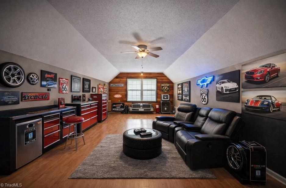 Virtually Staged Upper Garage space as Man Cave