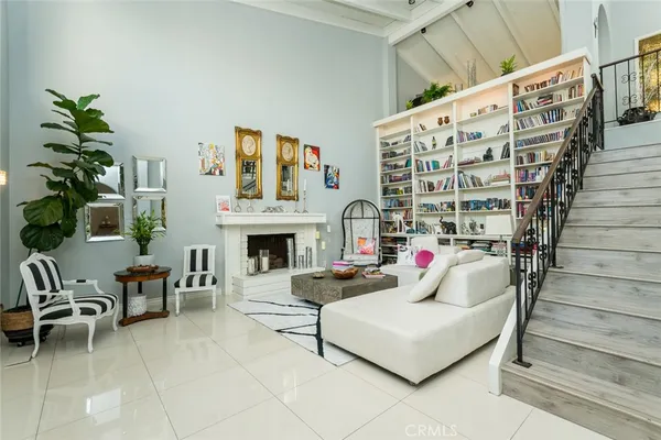 a living room with furniture and a table