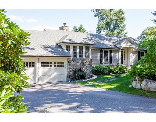 97 Meadowbrook Road Weston, MA 02493 - Photo 1 of 30 a front view of a house with a garden
