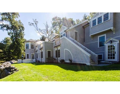 97 Meadowbrook Road Weston, MA 02493 - Photo 2 of 30 a black and white house with a big yard