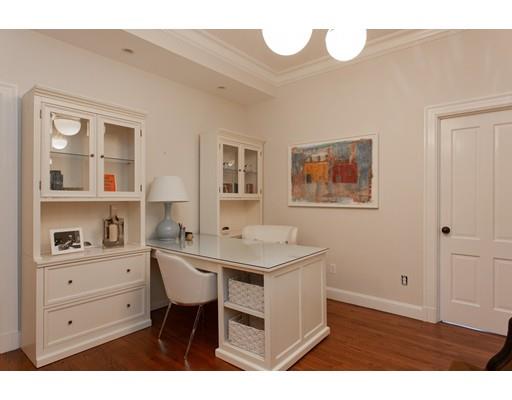 97 Meadowbrook Road Weston, MA 02493 - Photo 21 of 30 a dining room with a table and chairs