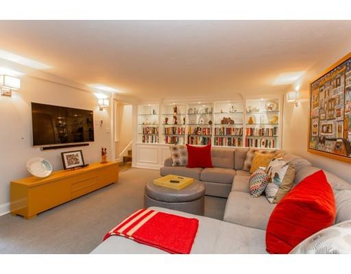 97 Meadowbrook Road Weston, MA 02493 - Photo 25 of 30 a living room with furniture and a flat screen tv
