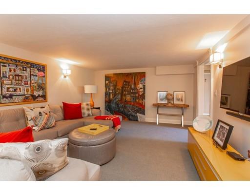 97 Meadowbrook Road Weston, MA 02493 - Photo 26 of 30 a living room with furniture and a flat screen tv