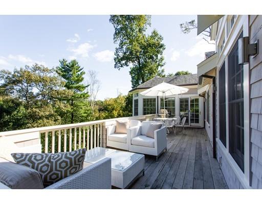 97 Meadowbrook Road Weston, MA 02493 - Photo 4 of 30 a view of a patio with a table and chairs