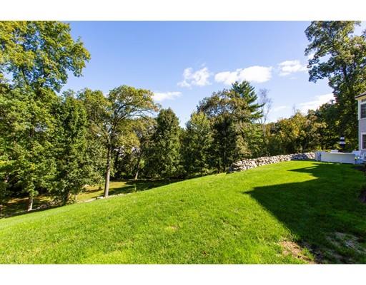 97 Meadowbrook Road Weston, MA 02493 - Photo 7 of 30 a view of a green field with sky in the background