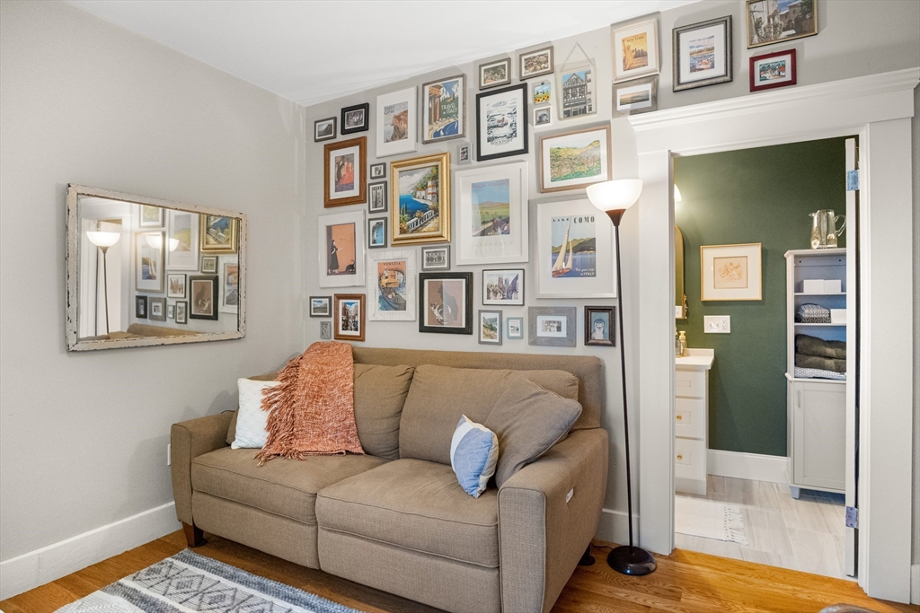 149 High Street, Unit 4 Danvers, MA 01923 - Photo 14 of 33 a living room with furniture and a potted plant