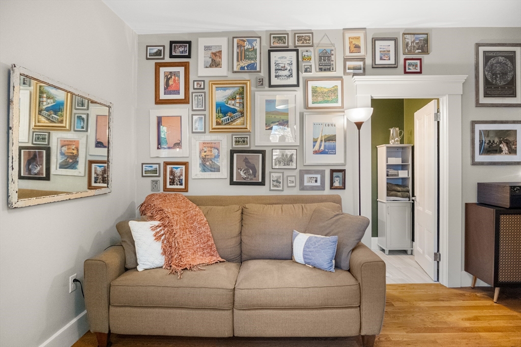 149 High Street, Unit 4 Danvers, MA 01923 - Photo 15 of 33 a living room with furniture and painting on the wall