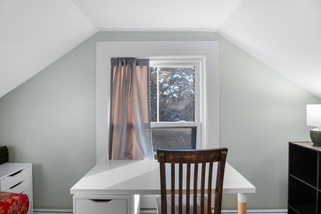 149 High Street, Unit 4 Danvers, MA 01923 - Photo 26 of 33 a view of a room that has a window and wooden floor