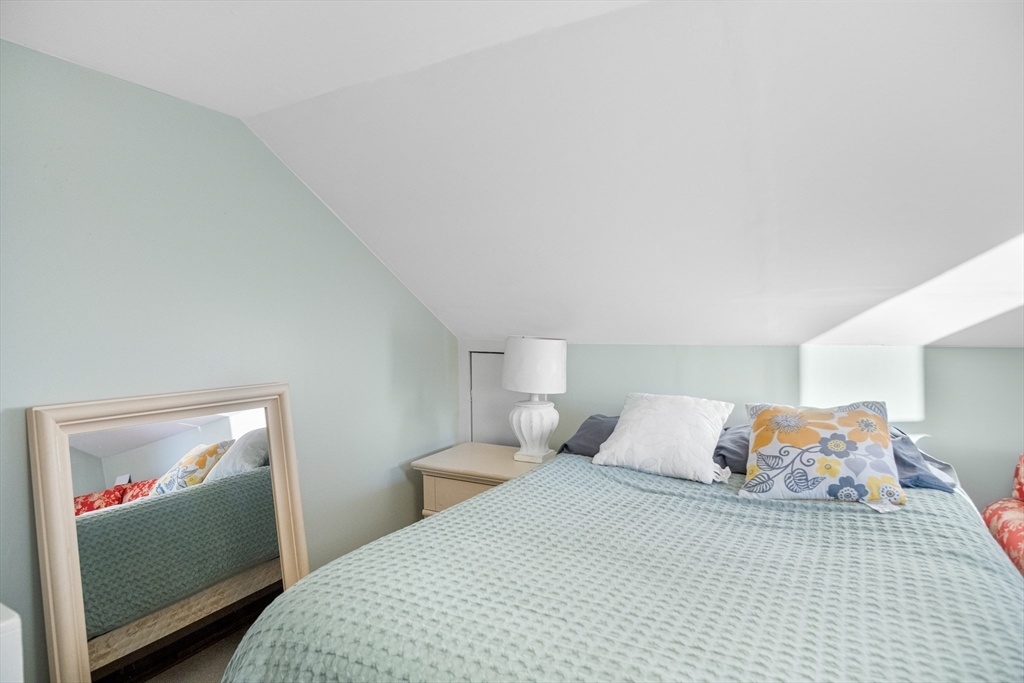 149 High Street, Unit 4 Danvers, MA 01923 - Photo 28 of 33 a bedroom with a bed and closet