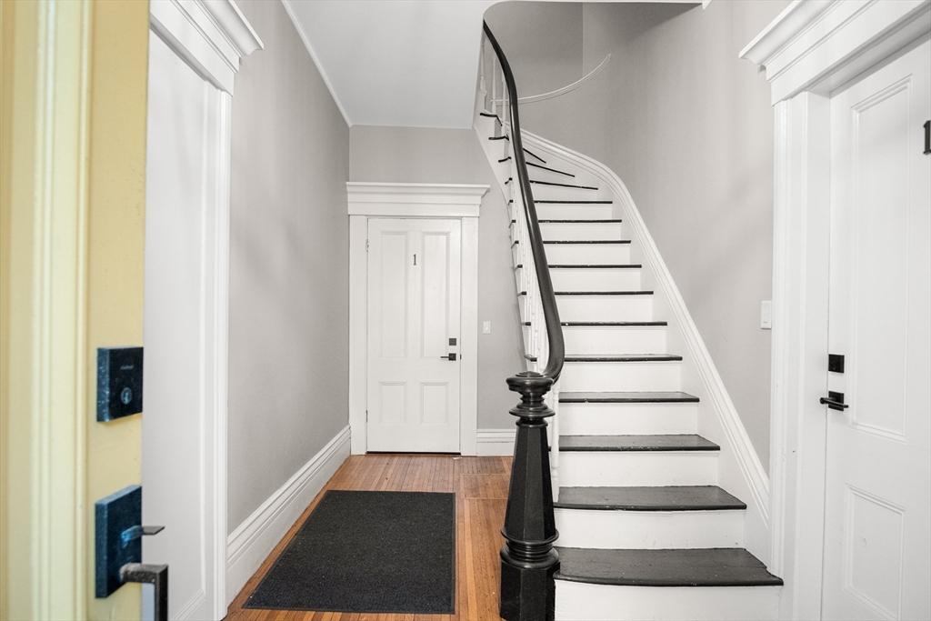 149 High Street, Unit 4 Danvers, MA 01923 - Photo 31 of 33 a view of entryway and gallery with wooden floor