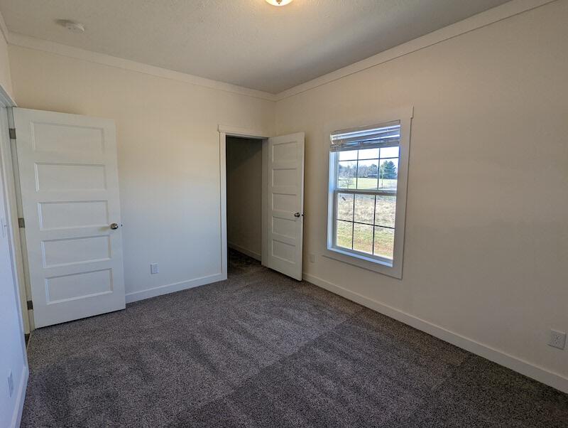 129 Long Level Road Southwest Floyd, VA 24091 - Photo 13 of 25 a view of an empty room with a window