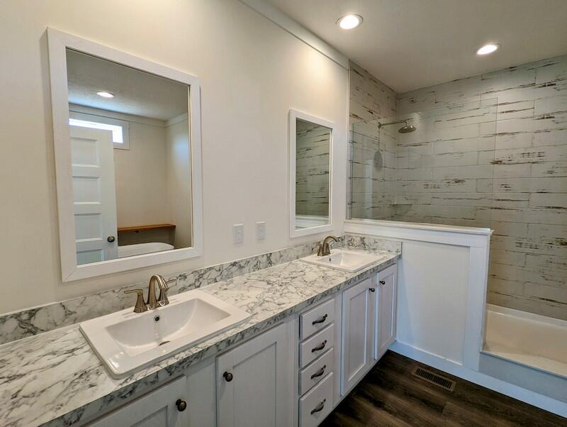 129 Long Level Road Southwest Floyd, VA 24091 - Photo 16 of 25 a bathroom with a sink and a mirror