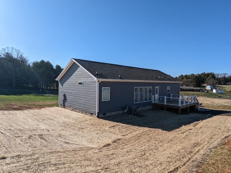 129 Long Level Road Southwest Floyd, VA 24091 - Photo 20 of 25 a backyard of a house with yard and outdoor seating