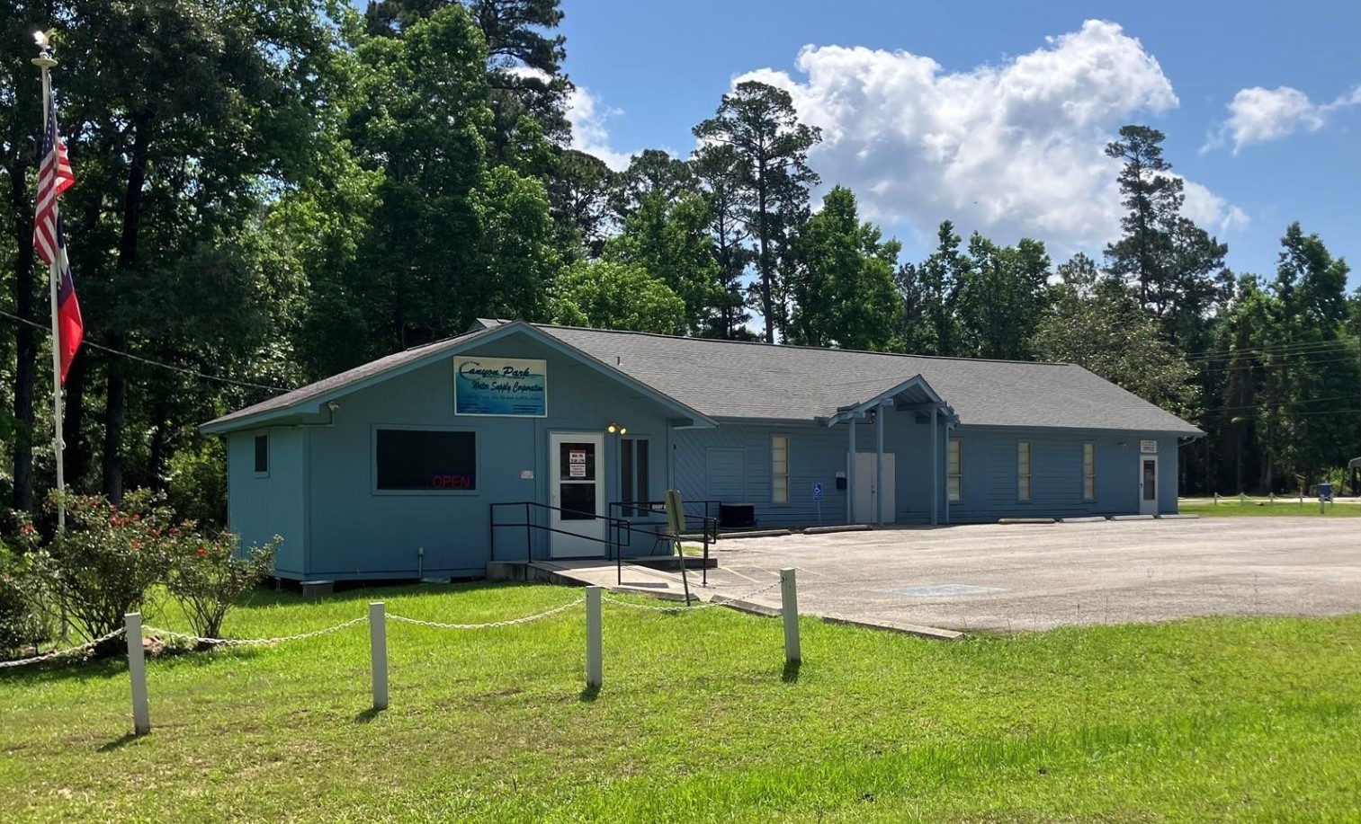 698 Huckleberry Road Onalaska, TX 77360 - Photo 2 of 5 a front view of house with yard and green space