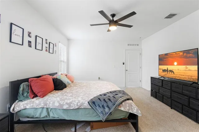 a bathroom with a granite countertop sink mirror and double