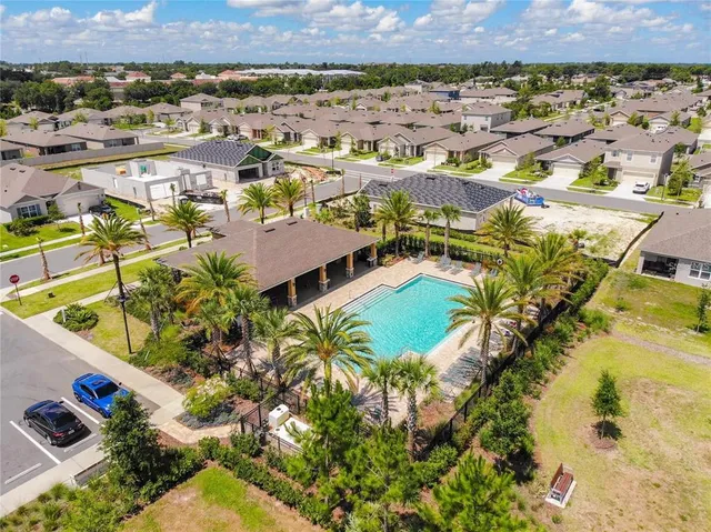 a view of a swimming pool with an ocean view