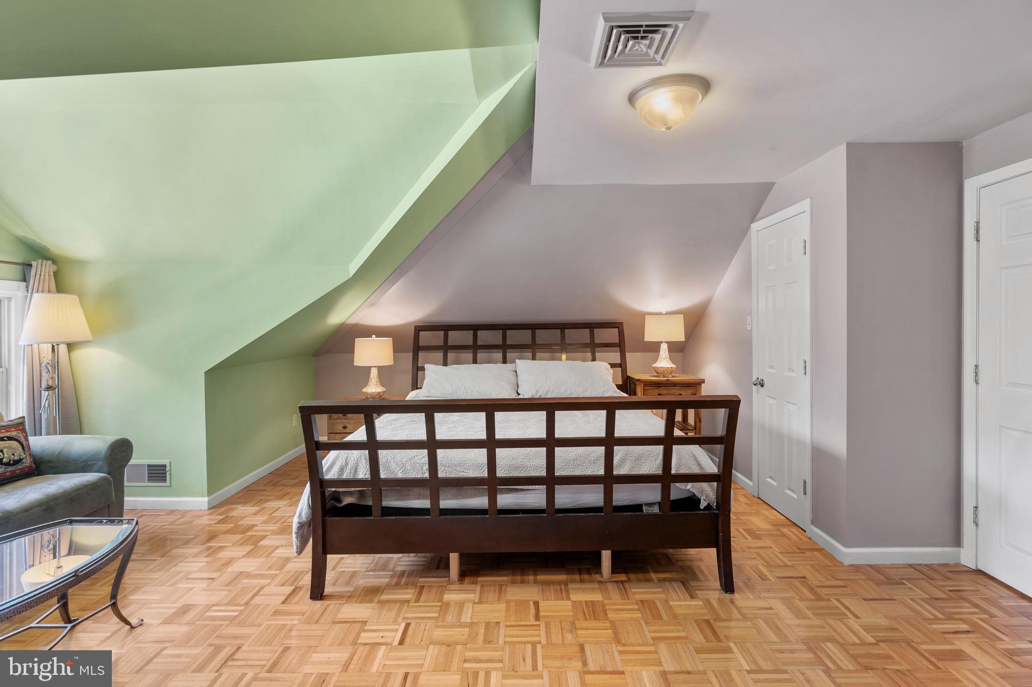 1118 Allston Road Havertown, PA 19083 - Photo 42 of 58 a bedroom with a bed and a lamp on dresser