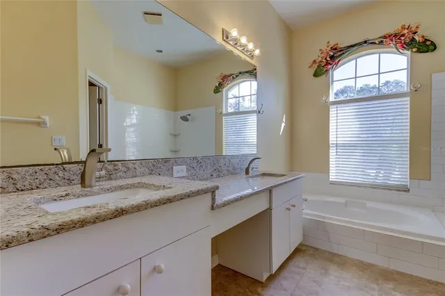 a view of a park with swings and slides