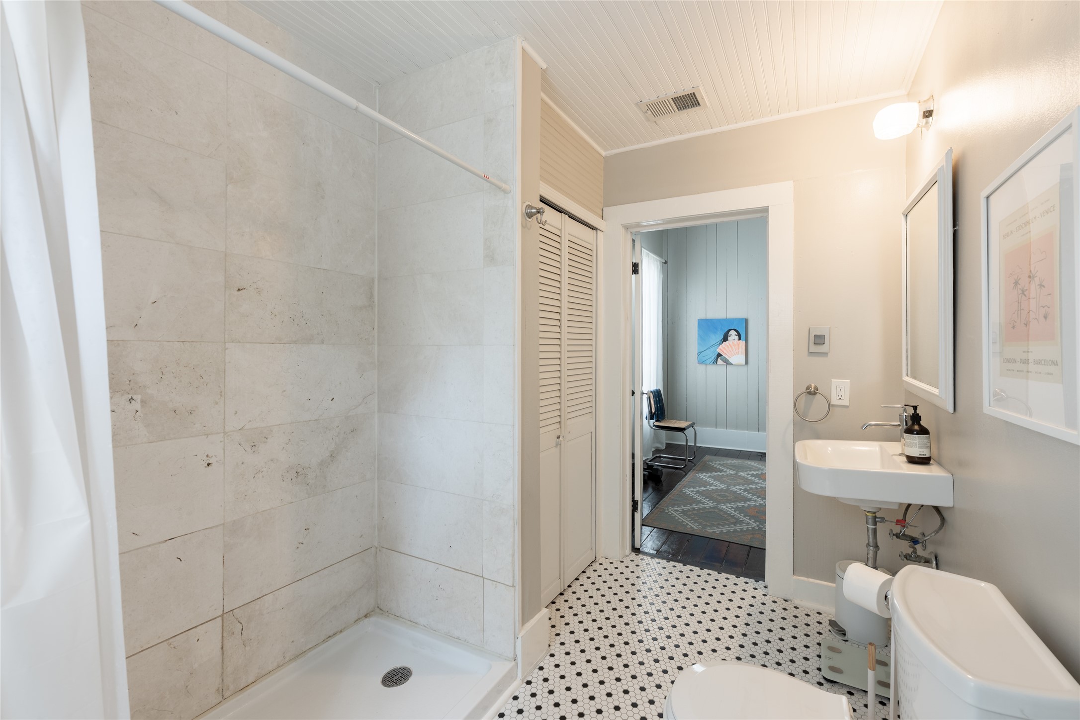 2011 Decatur Street Houston, TX 77007 - Photo 28 of 35 a bathroom with a sink and a shower