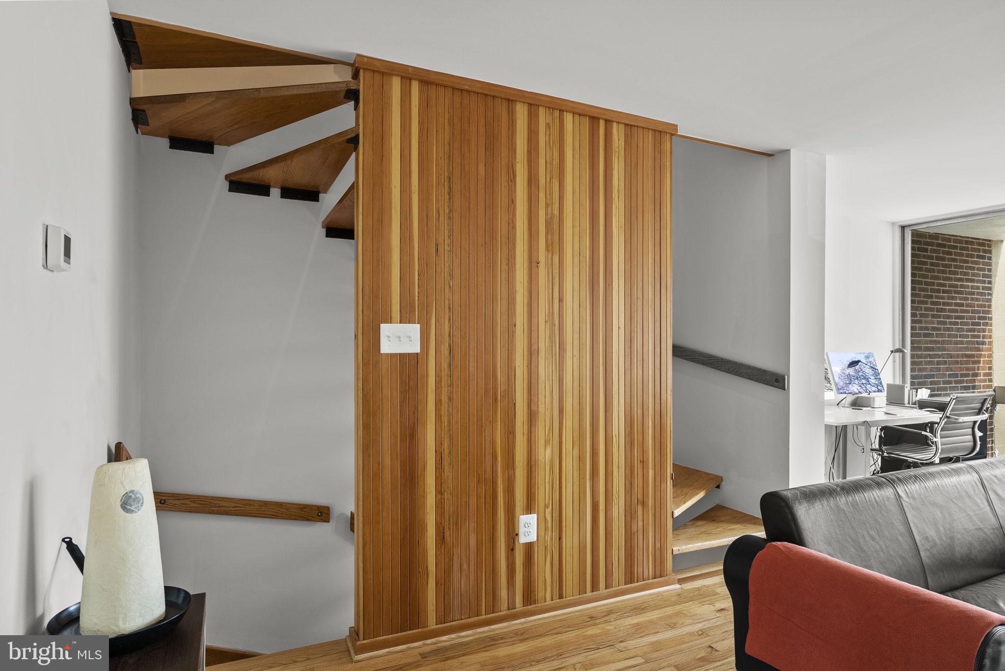 11585 Maple Ridge Road Reston, VA 20190 - Photo 16 of 48 a living room with furniture and a window
