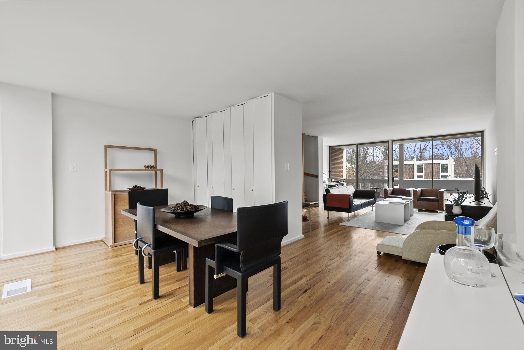 11585 Maple Ridge Road Reston, VA 20190 - Photo 18 of 48 a living room with furniture and wooden floor