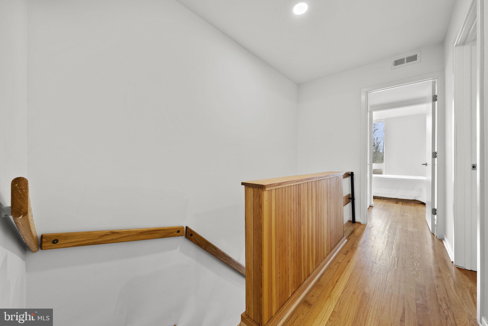 11585 Maple Ridge Road Reston, VA 20190 - Photo 21 of 48 a view of a room with wooden floor and a sink