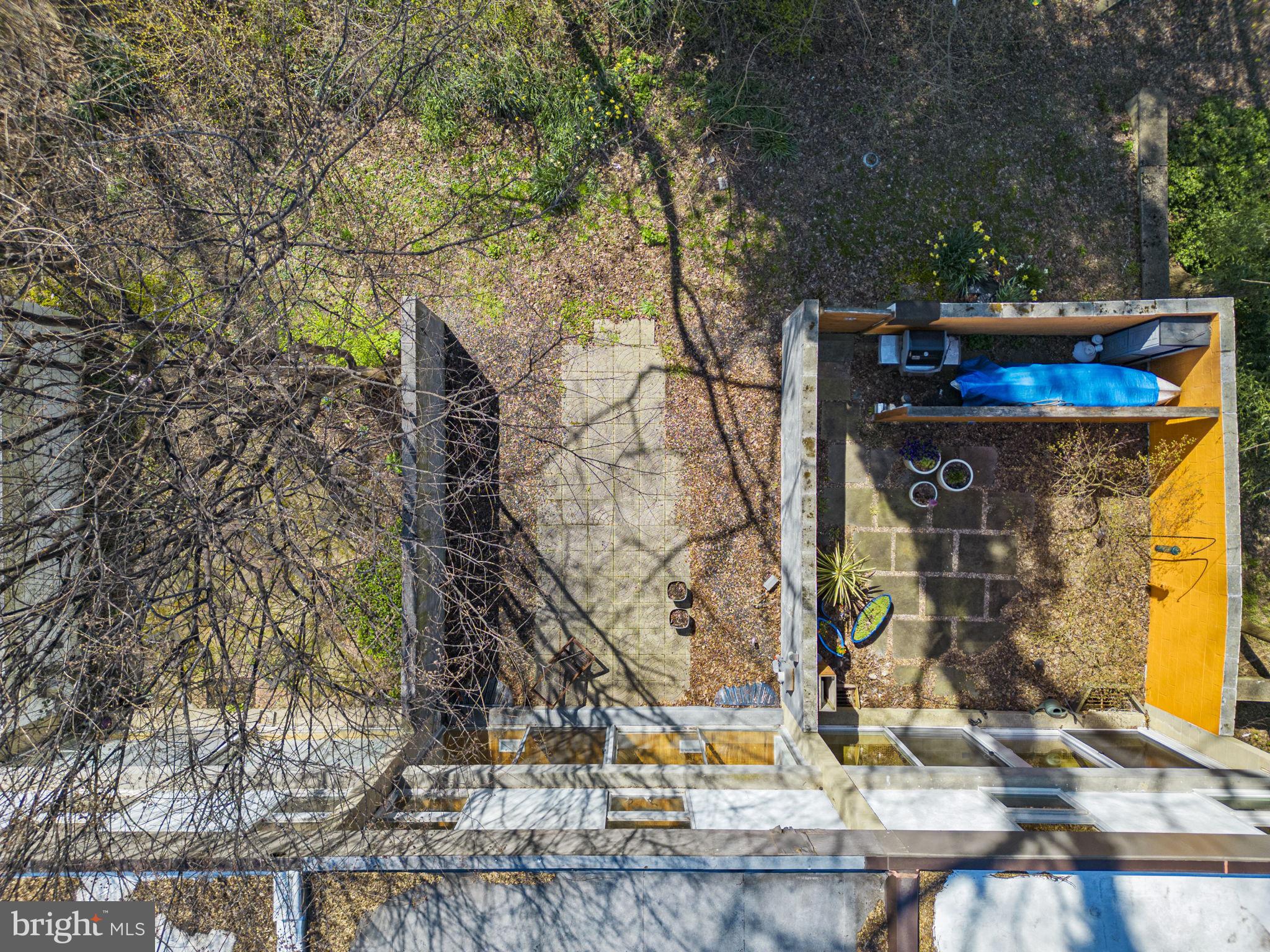 11585 Maple Ridge Road Reston, VA 20190 - Photo 36 of 48 a view of a house with a tree