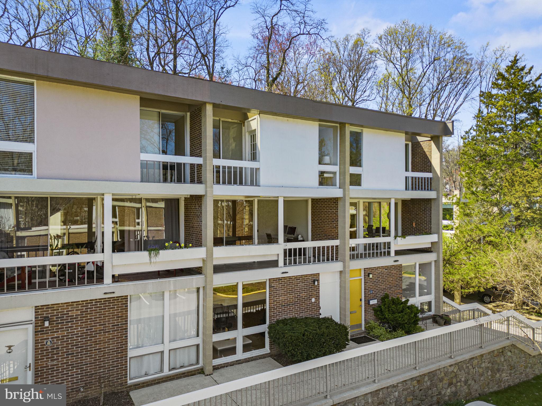 11585 Maple Ridge Road Reston, VA 20190 - Photo 41 of 48 front view of a building with a street
