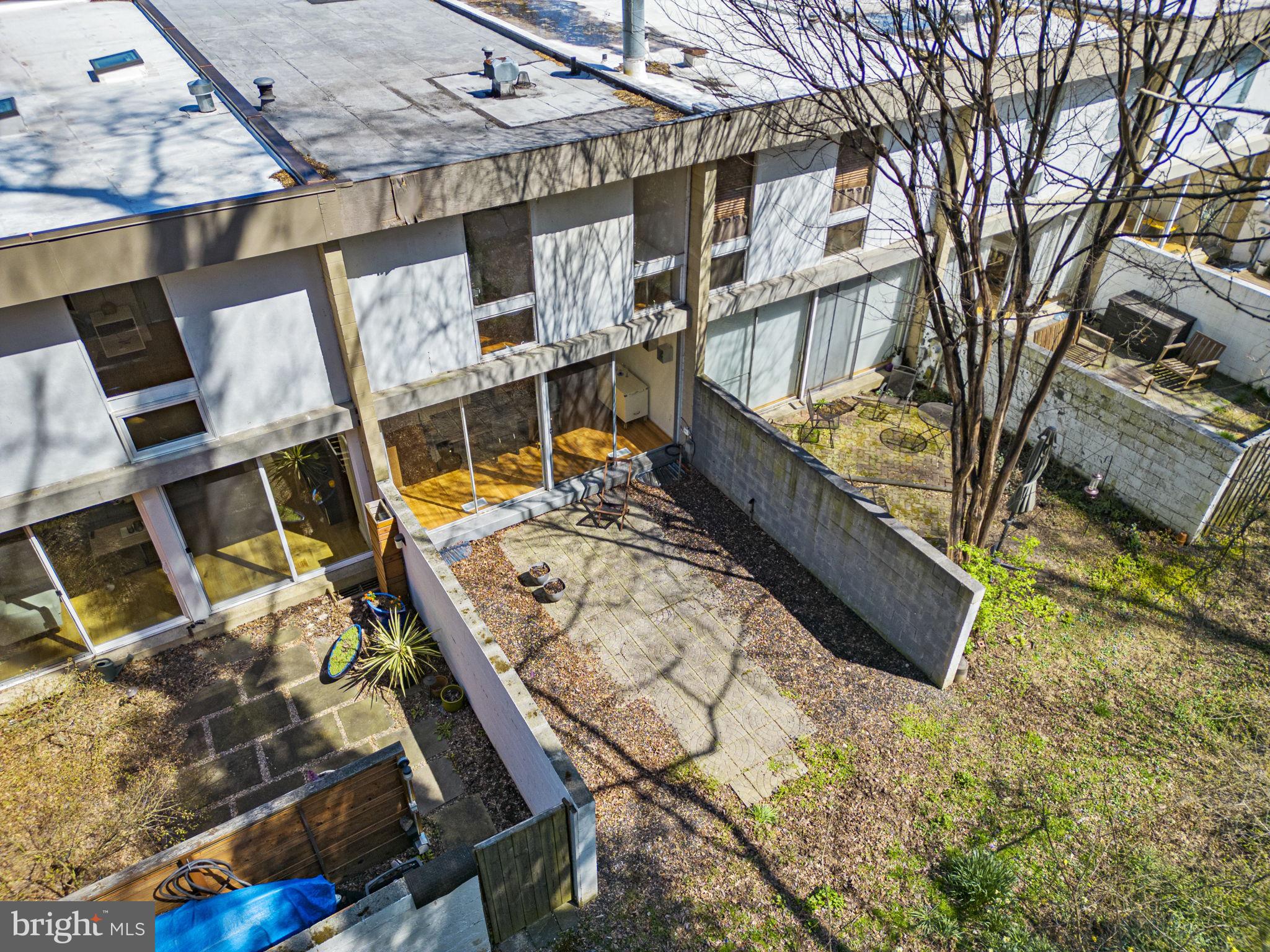 11585 Maple Ridge Road Reston, VA 20190 - Photo 43 of 48 a view of an chairs and table in the balcony