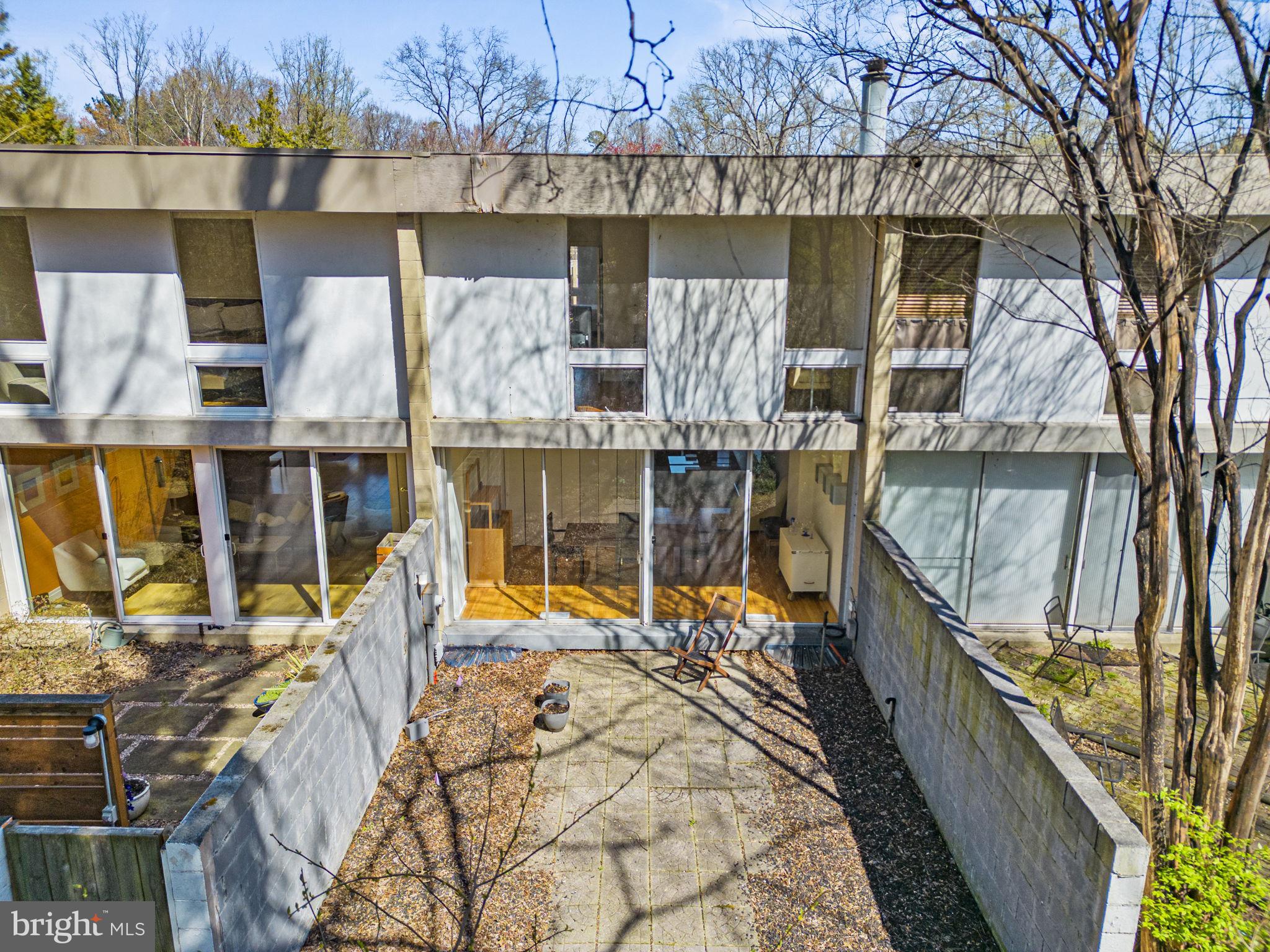 11585 Maple Ridge Road Reston, VA 20190 - Photo 44 of 48 a view of a house with a lake view