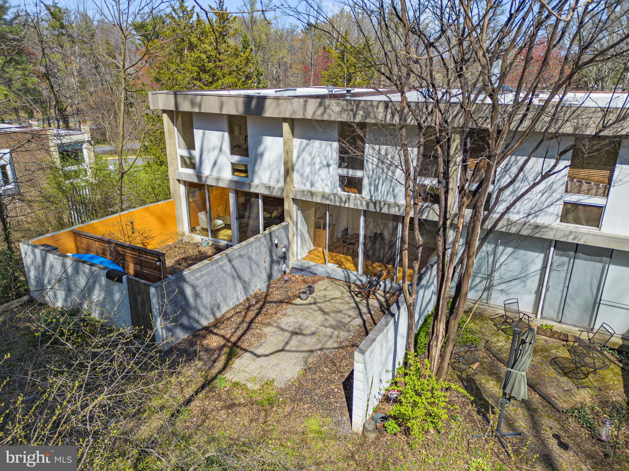 11585 Maple Ridge Road Reston, VA 20190 - Photo 45 of 48 front view of a house with a yard