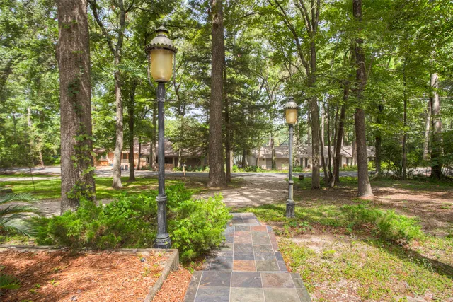 an aerial view of a house with yard